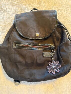 Coach Black Signature Mini Backpack with Pink Flower Charm
